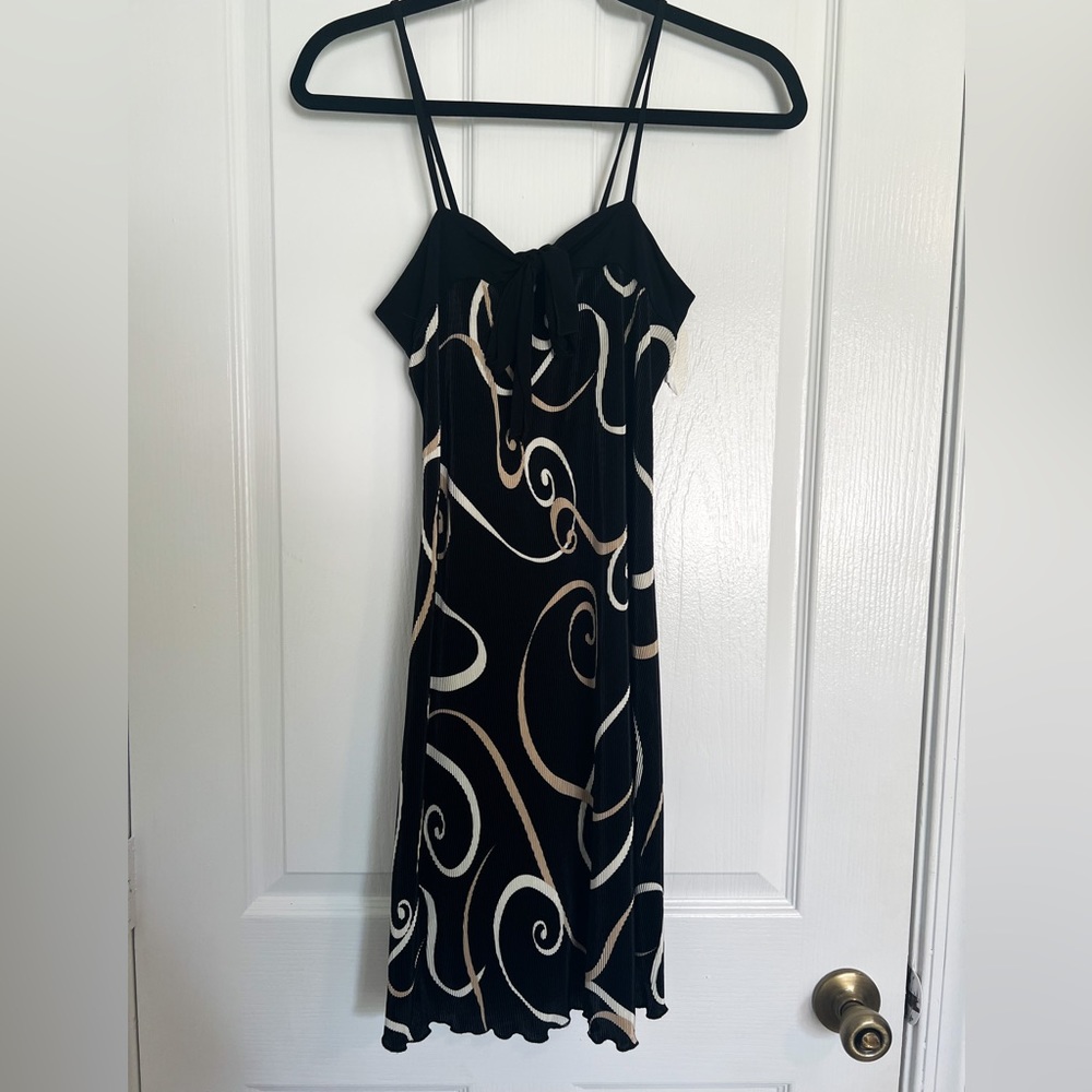 Black dress in size small, never worn with tags